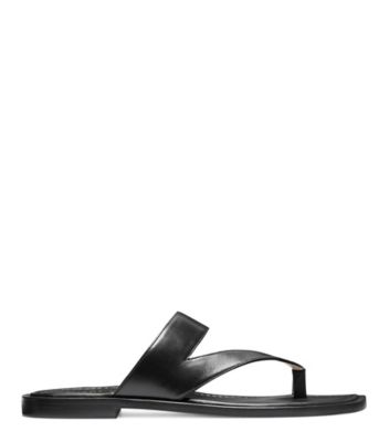 Stuart Weitzman,Lyla Flat Sandal,Slide,Lacquered Nappa Leather,Black,Front View