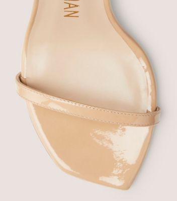 Stuart Weitzman,Nudistcurve 100 Sandal,Sandal,Patent leather,Adobe Beige,top down View