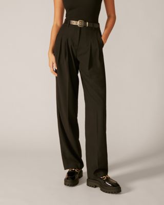 Stuart Weitzman,OWEN BUCKLE ULTRA LUG LOAFER,Leather,Loafer,Penny Loafer,Horsebit,Casual,Black,Shoe on tall model