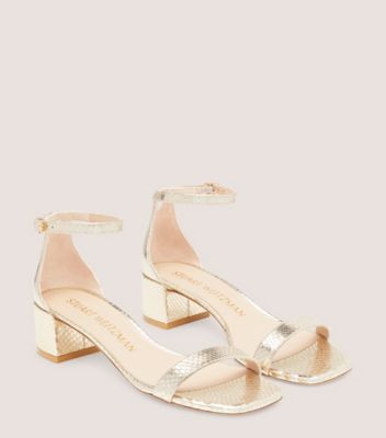 Stuart Weitzman,NUDISTCURVE 35 BLOCK SANDAL,Leather,Metallic,Sandals,Day Party,Gold,Metallic,Angle View