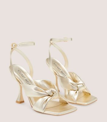 Stuart Weitzman,Playa Ankle-Strap 100 Knot Sandal,Sandal,Liquid Metallic Leather,Platino Gold,Angle View