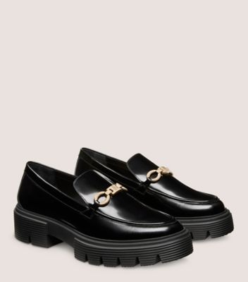 Stuart Weitzman,NOLITA SW SIGNATURE LOAFER,Rubber,Flats,Loafer,Notched Embellishment,Metal,Gold Metal,Work,Black