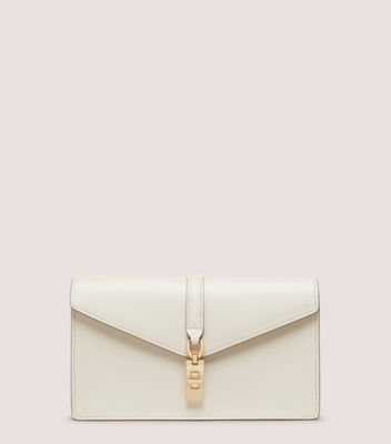 Shop Stuart Weitzman Milan Loveletter Clutch Handbags In Oat
