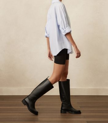 Stuart Weitzman,CELIA RIDING BOOT,Boots,Pull Tab,Casual,Black,Shoe on tall model