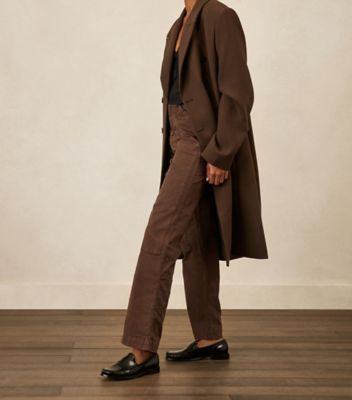 Stuart Weitzman,LOTTIE LOAFER,Rubber,Loafer,Penny Loafer,Work,Black,Shoe on tall model