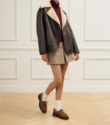 Stuart Weitzman,HUDSON MOCCASIN,,Shoe on tall model